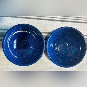 Set of two blue and white metal enamel bowls